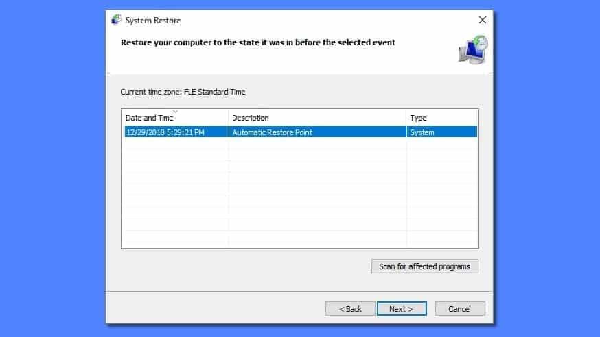 Choose system restore point created before ransomware infection